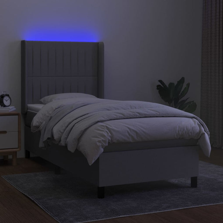 Boxspring met matras en LED stof lichtgrijs 80x200 cm