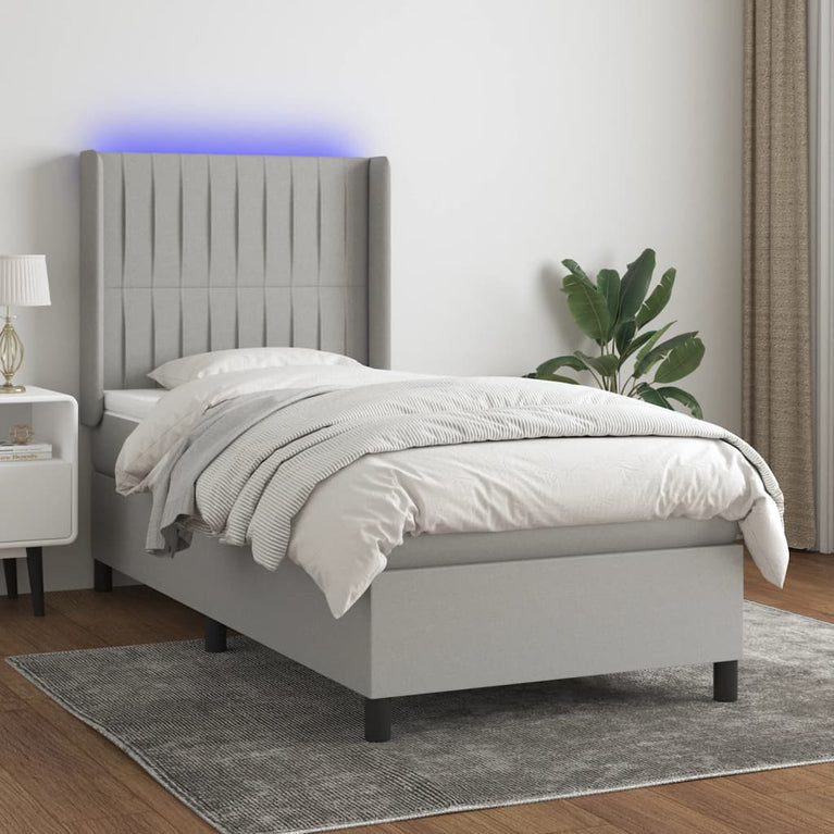 Boxspring met matras en LED stof lichtgrijs 80x200 cm