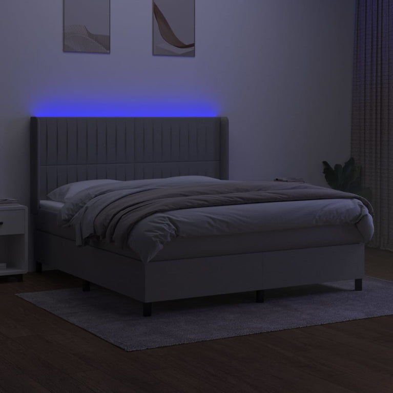 Boxspring met matras en LED stof lichtgrijs 160x200 cm