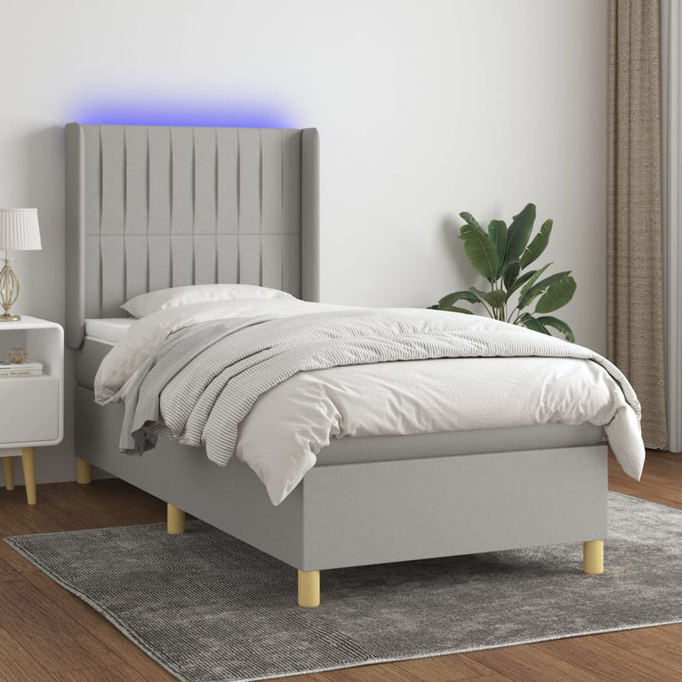 Boxspring met matras en LED stof lichtgrijs 80x200 cm