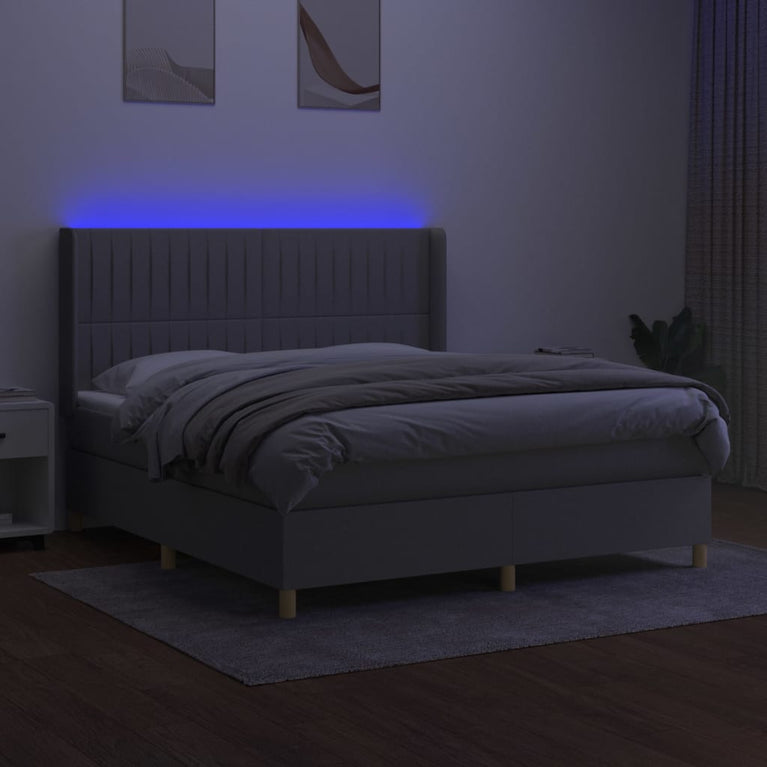 Boxspring met matras en LED stof lichtgrijs 160x200 cm