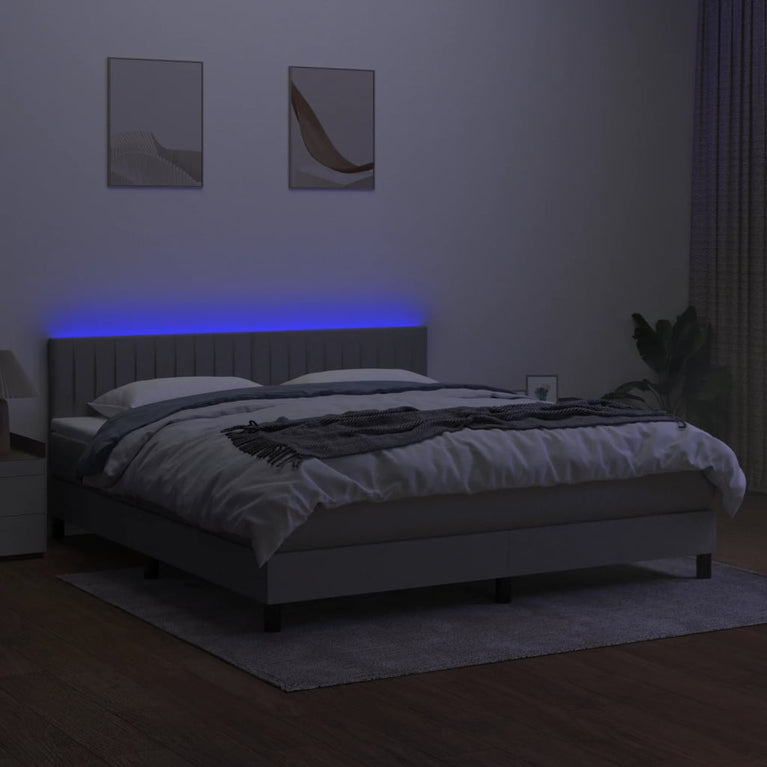 Boxspring met matras en LED stof lichtgrijs 160x200 cm