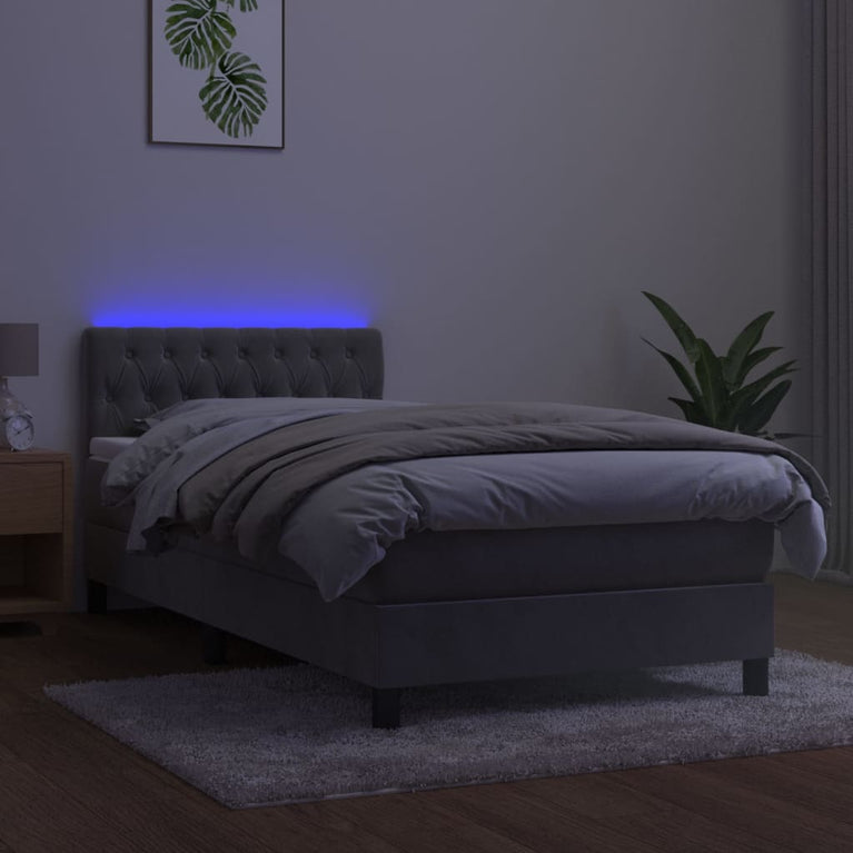 Boxspring met matras en LED fluweel lichtgrijs 90x190 cm