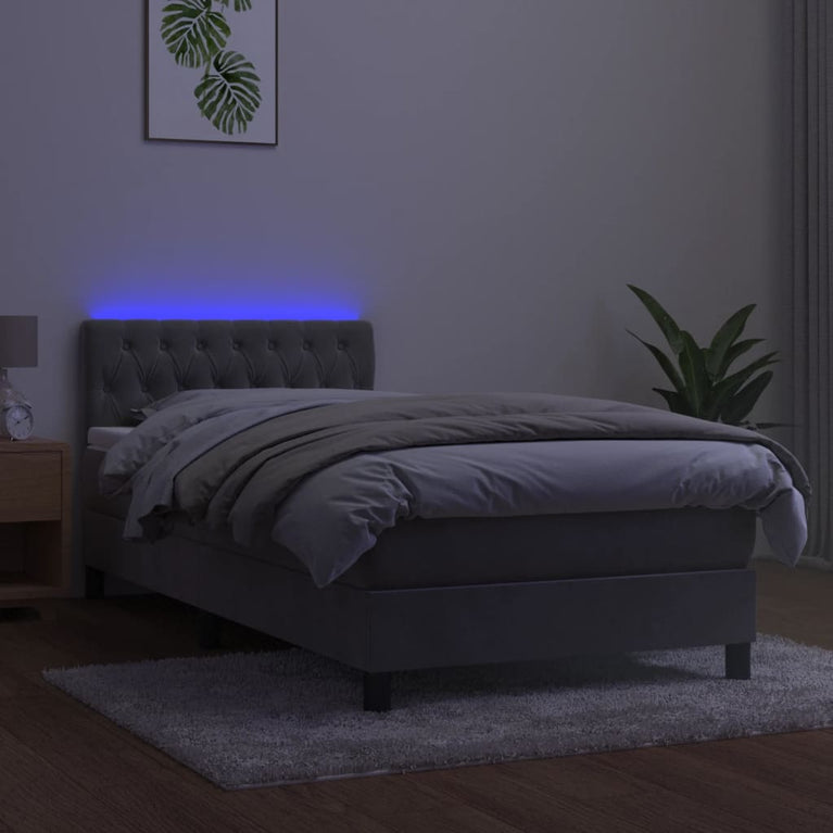 Boxspring met matras en LED fluweel lichtgrijs 90x200 cm