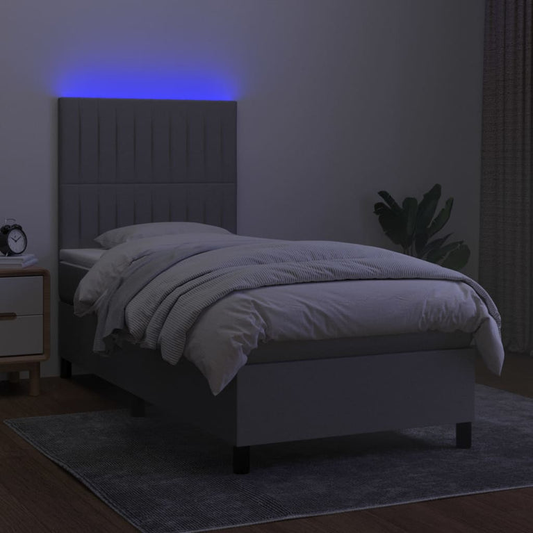 Boxspring met matras en LED stof lichtgrijs 80x200 cm