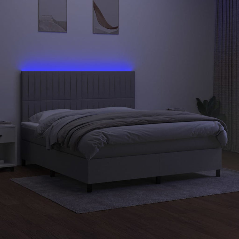 Boxspring met matras en LED stof lichtgrijs 160x200 cm