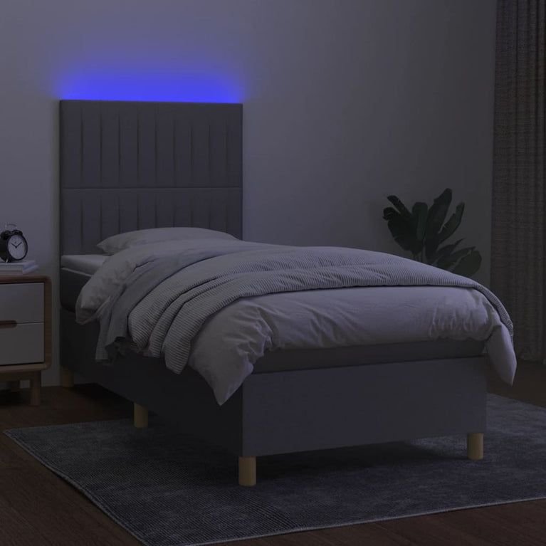 Boxspring met matras en LED stof lichtgrijs 80x200 cm