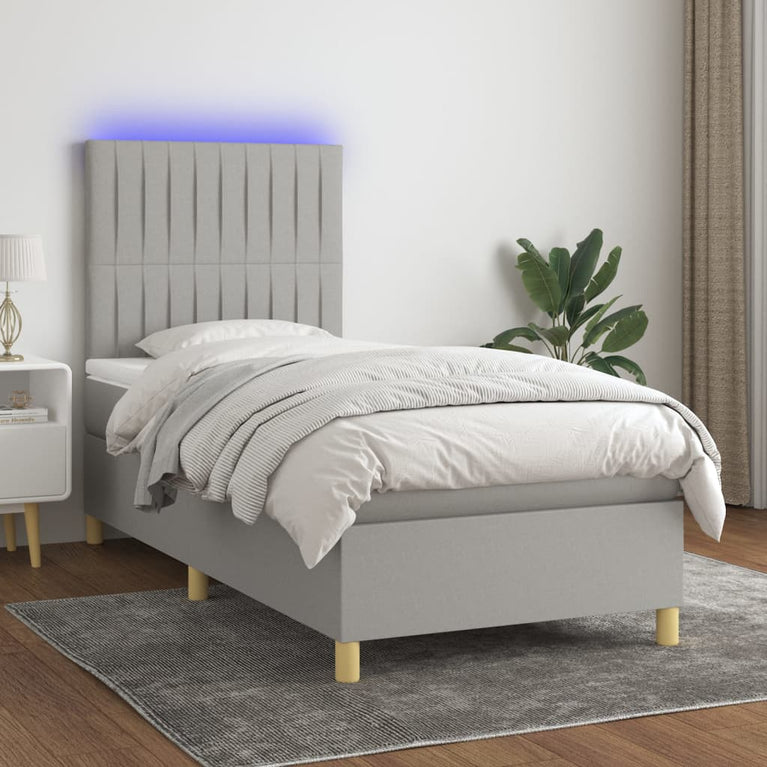 Boxspring met matras en LED stof lichtgrijs 80x200 cm