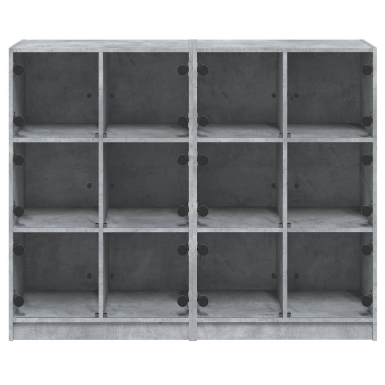 Boekenkast met deuren 136x37x109 cm bewerkt hout betongrijs