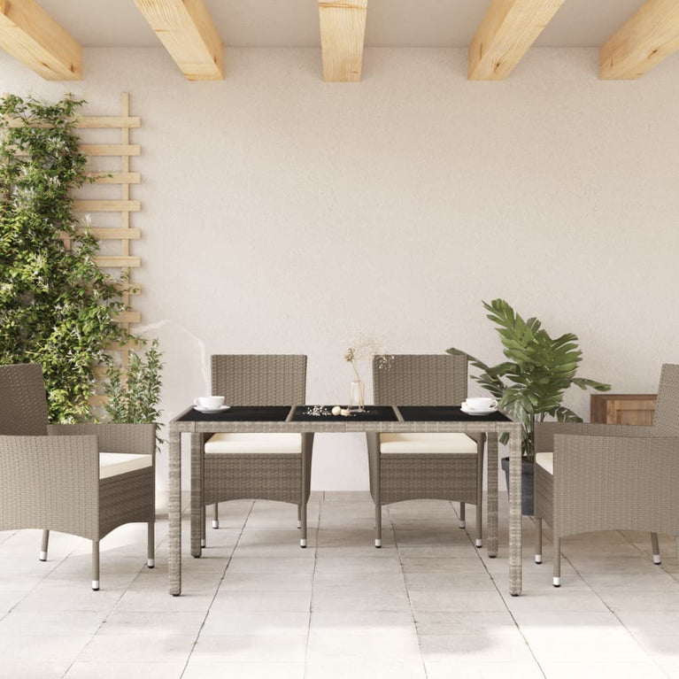 Tuintafel met glazen blad 150x90x75 cm poly rattan lichtgrijs