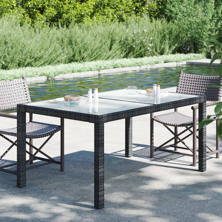 Tuintafel 150x90x75 cm gehard glas en poly rattan zwart MeubelReus