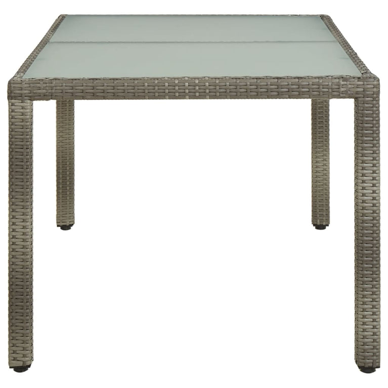 Tuintafel 150x90x75 cm gehard glas en poly rattan grijs MeubelReus