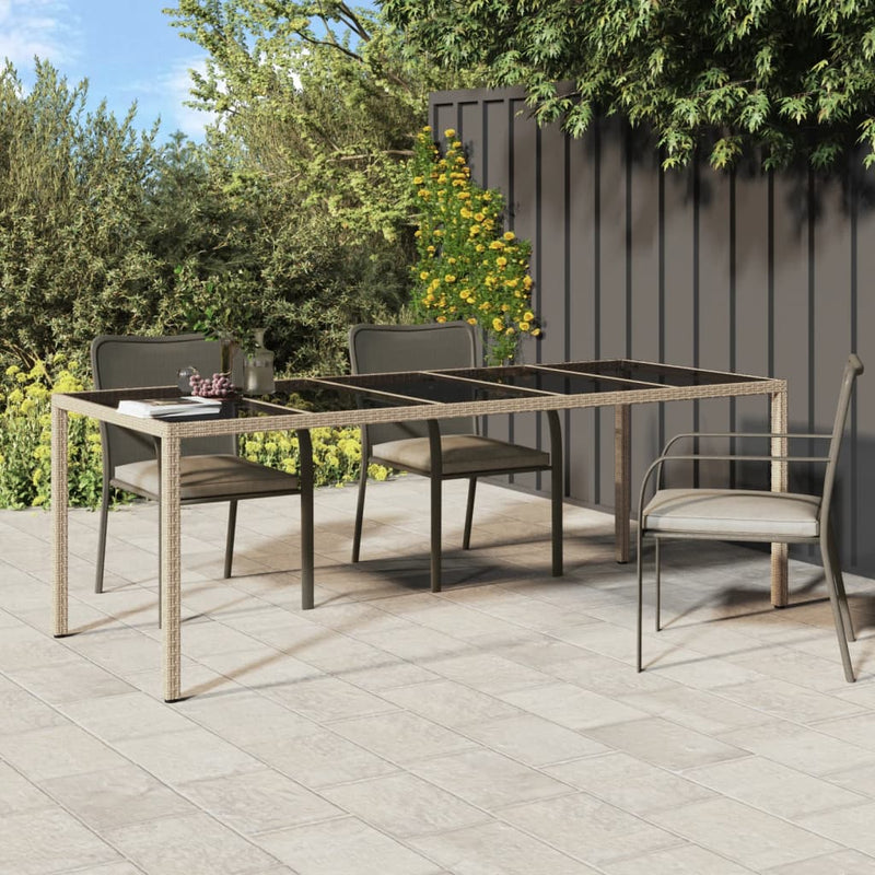 Tuintafel 250x100x75 cm gehard glas en poly rattan beige MeubelReus