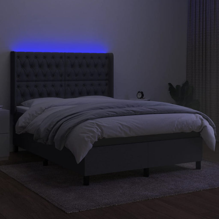 Boxspring met matras en LED stof donkergrijs 140x190 cm