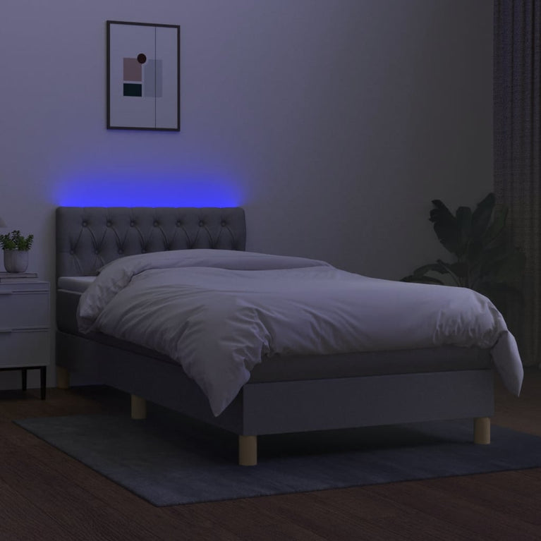 Boxspring met matras en LED stof lichtgrijs 90x200 cm