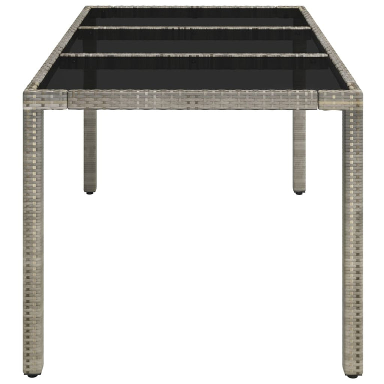 Tuintafel met glazen blad 150x90x75 cm poly rattan grijs MeubelReus