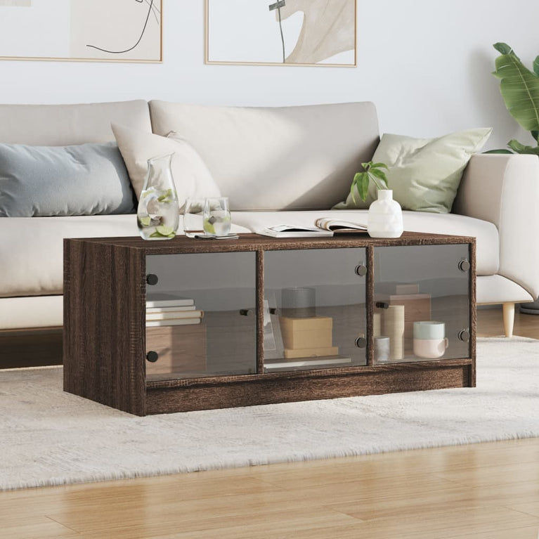Salontafel met glazen deuren 102x50x42 cm bruineikenkleurig