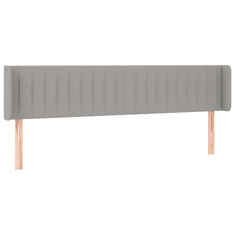 Hoofdbord met randen 163x16x78/88 cm stof lichtgrijs