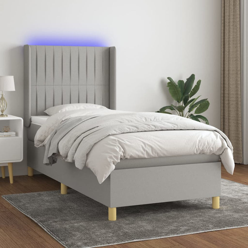 Boxspring met matras en LED stof lichtgrijs 80x200 cm
