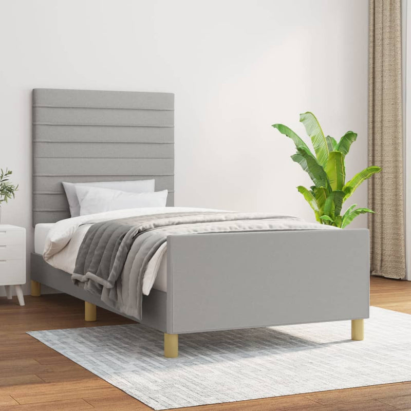 Bedframe met hoofdeinde stof lichtgrijs 90x190 cm