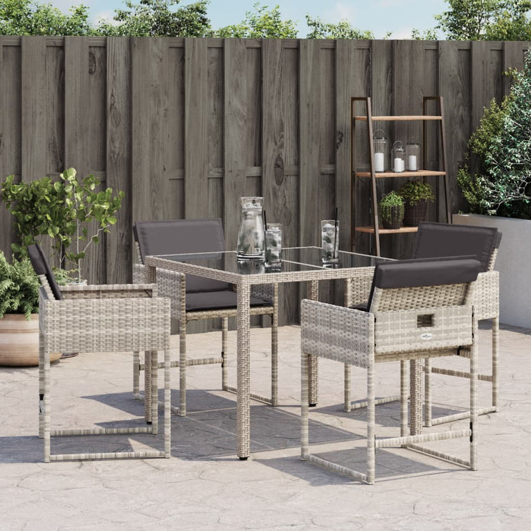 Tuinstoelen 4 st met kussens poly rattan lichtgrijs