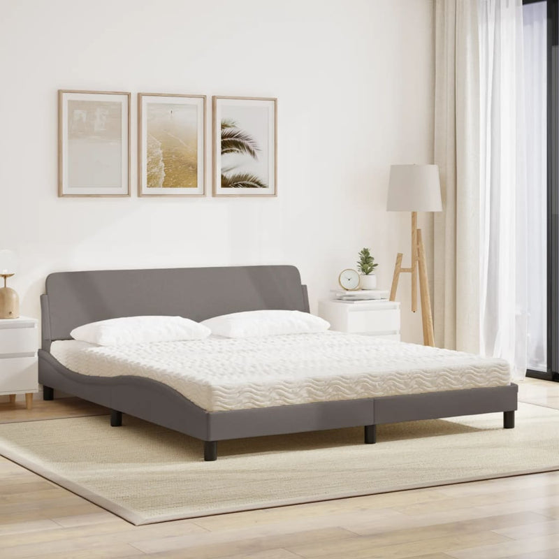 Bed met matras stof taupe 180x200 cm