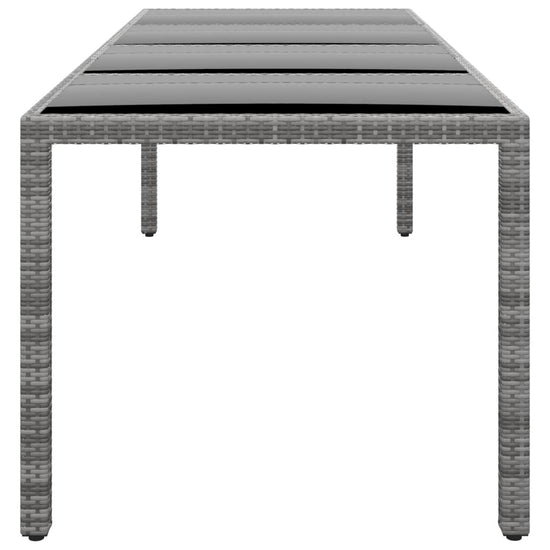 Tuintafel 250x100x75 cm gehard glas en poly rattan grijs MeubelReus