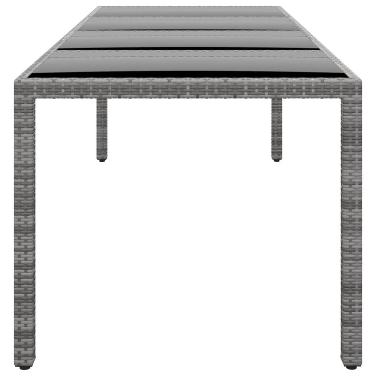 Tuintafel 250x100x75 cm gehard glas en poly rattan grijs MeubelReus