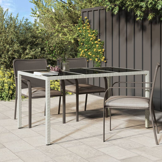 Tuintafel 150x90x75 cm gehard glas en poly rattan wit MeubelReus