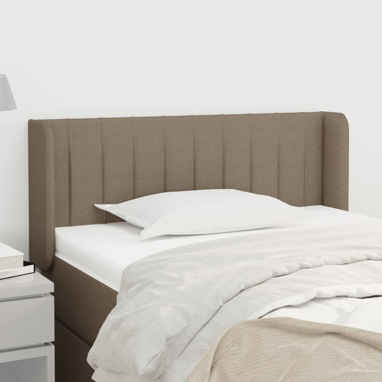 Hoofdbord met randen 103x16x78/88 cm stof taupe