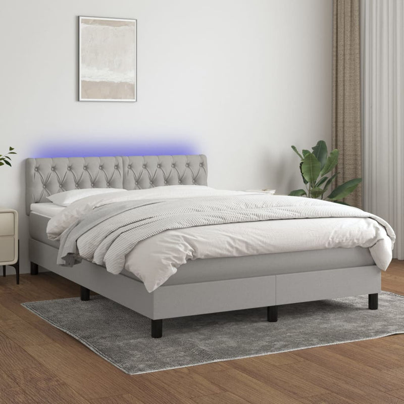 Boxspring met matras en LED stof lichtgrijs 140x200 cm