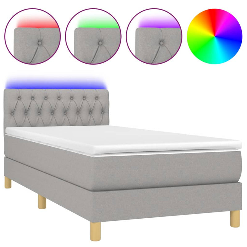Boxspring met matras en LED stof lichtgrijs 90x200 cm