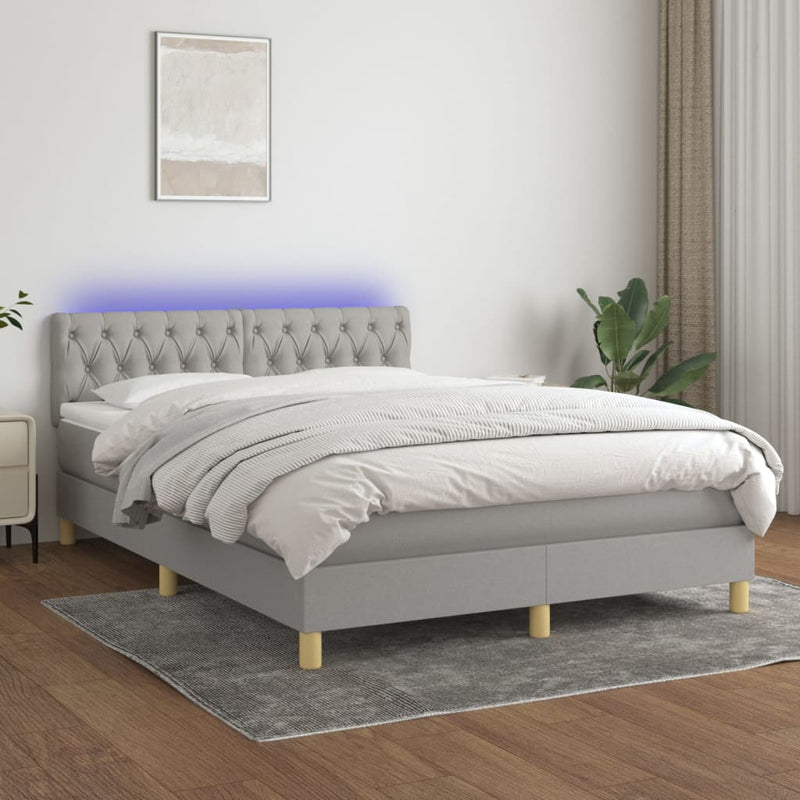 Boxspring met matras en LED stof lichtgrijs 140x190 cm