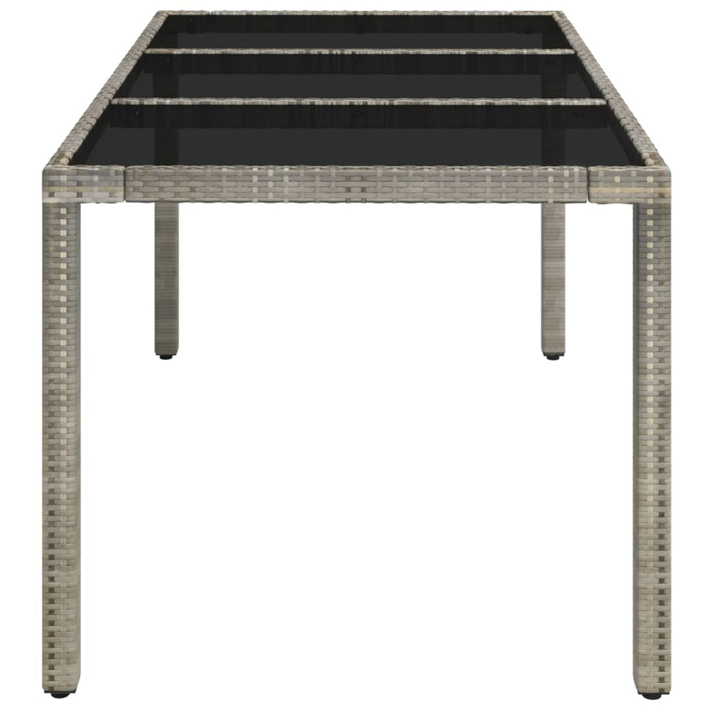 Tuintafel met glazen blad 150x90x75 cm poly rattan grijs MeubelReus