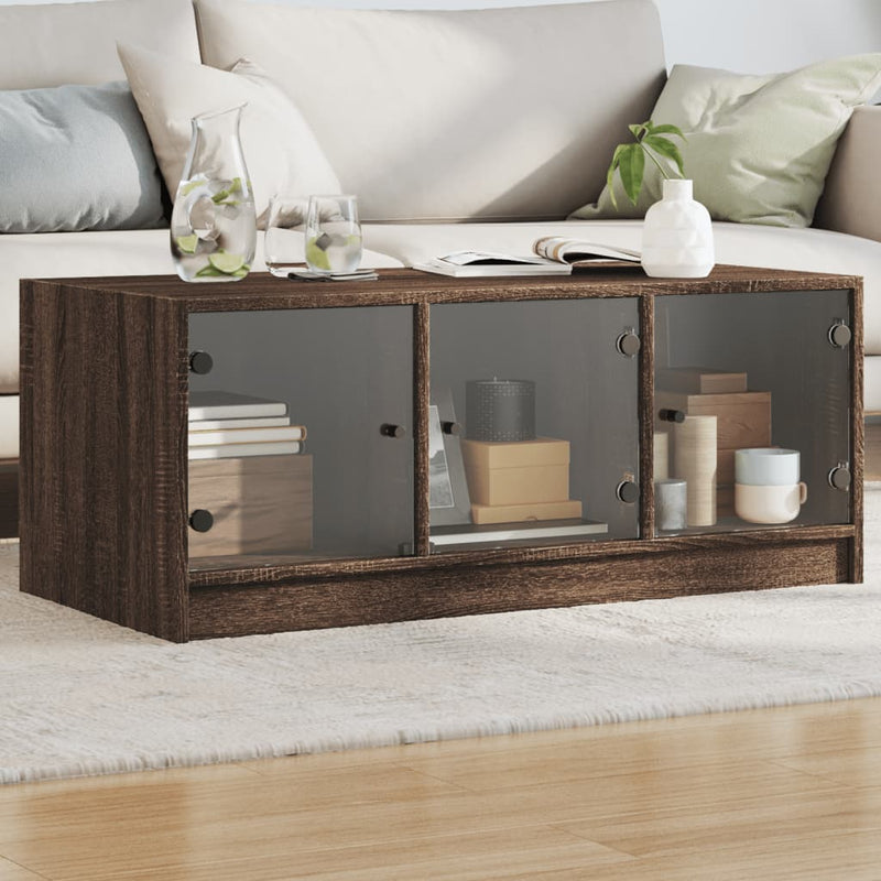 Salontafel met glazen deuren 102x50x42 cm bruineikenkleurig